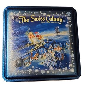 The Swiss colony christmas Santa tin
